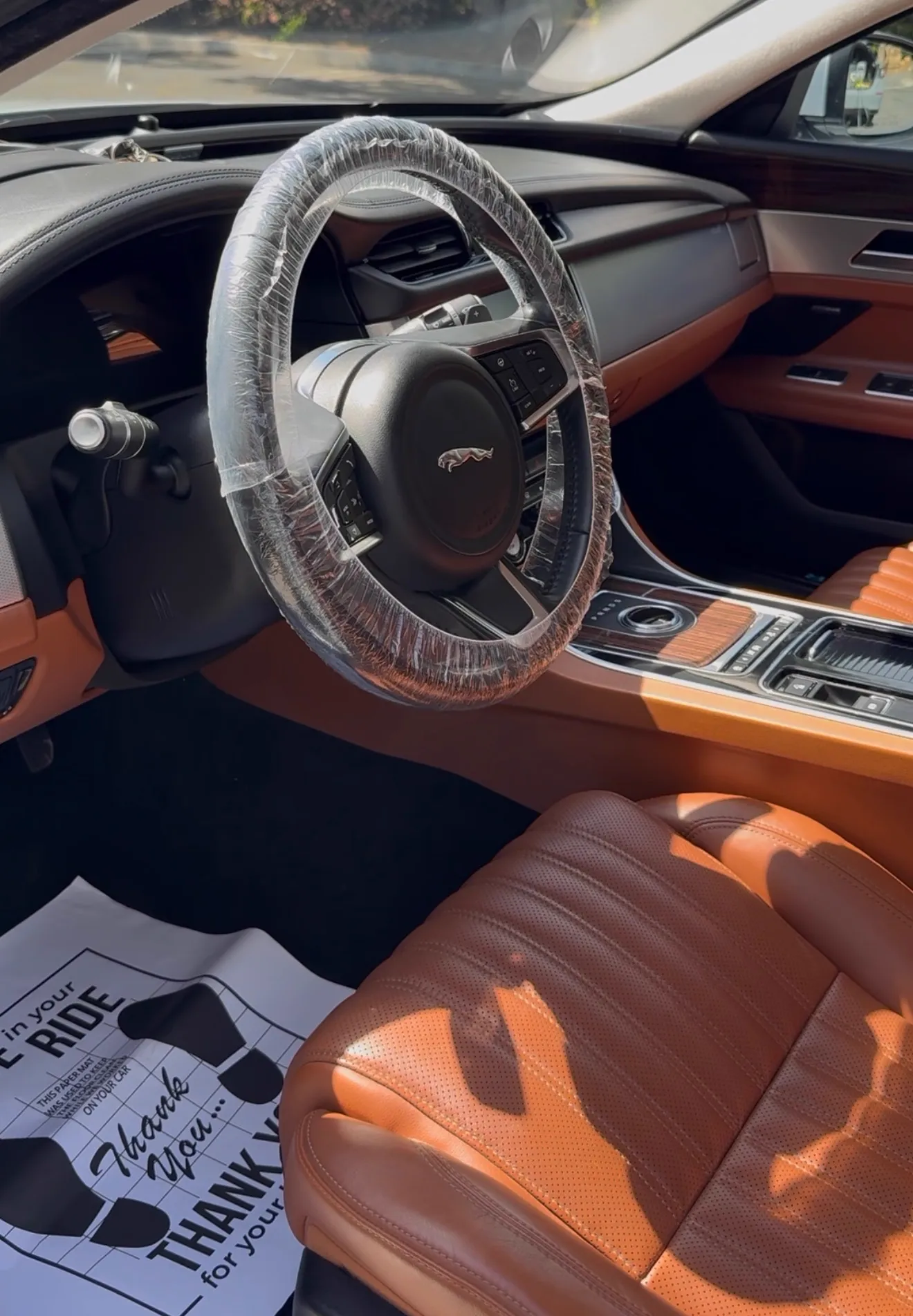 Jaguar interior detail with tan leather